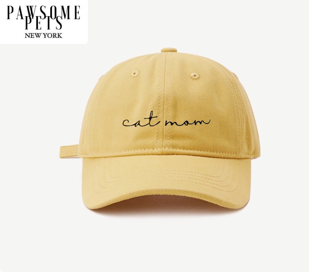 Yellow CAT MOM baseball cap with embroidered lettering, featuring a pre-curved visor and adjustable metal buckle closure.