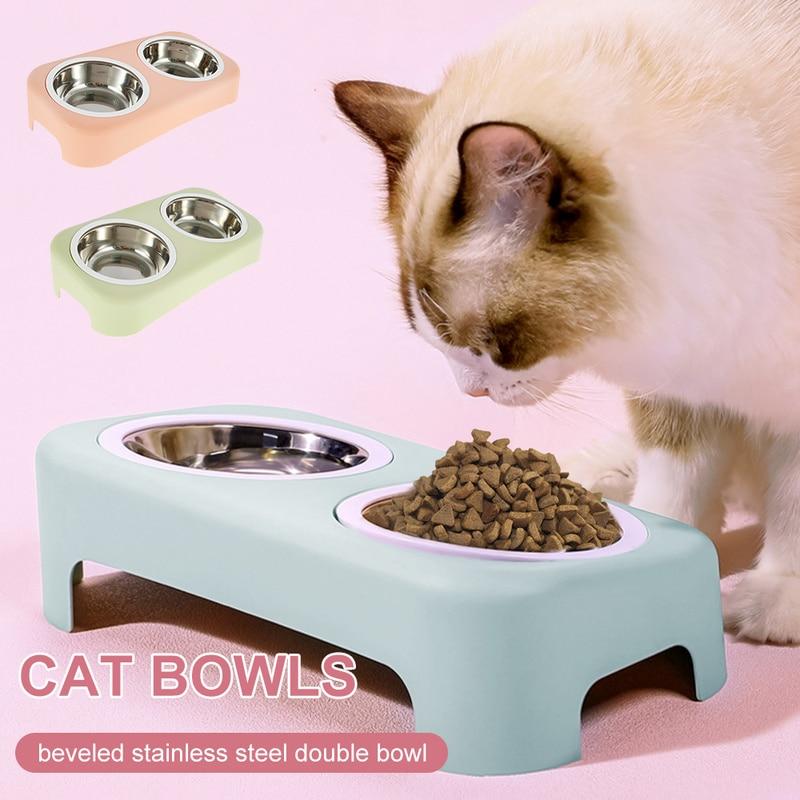A pair of round stainless steel bowls for cats and small dogs, featuring an anti-skid base for stability during feeding.