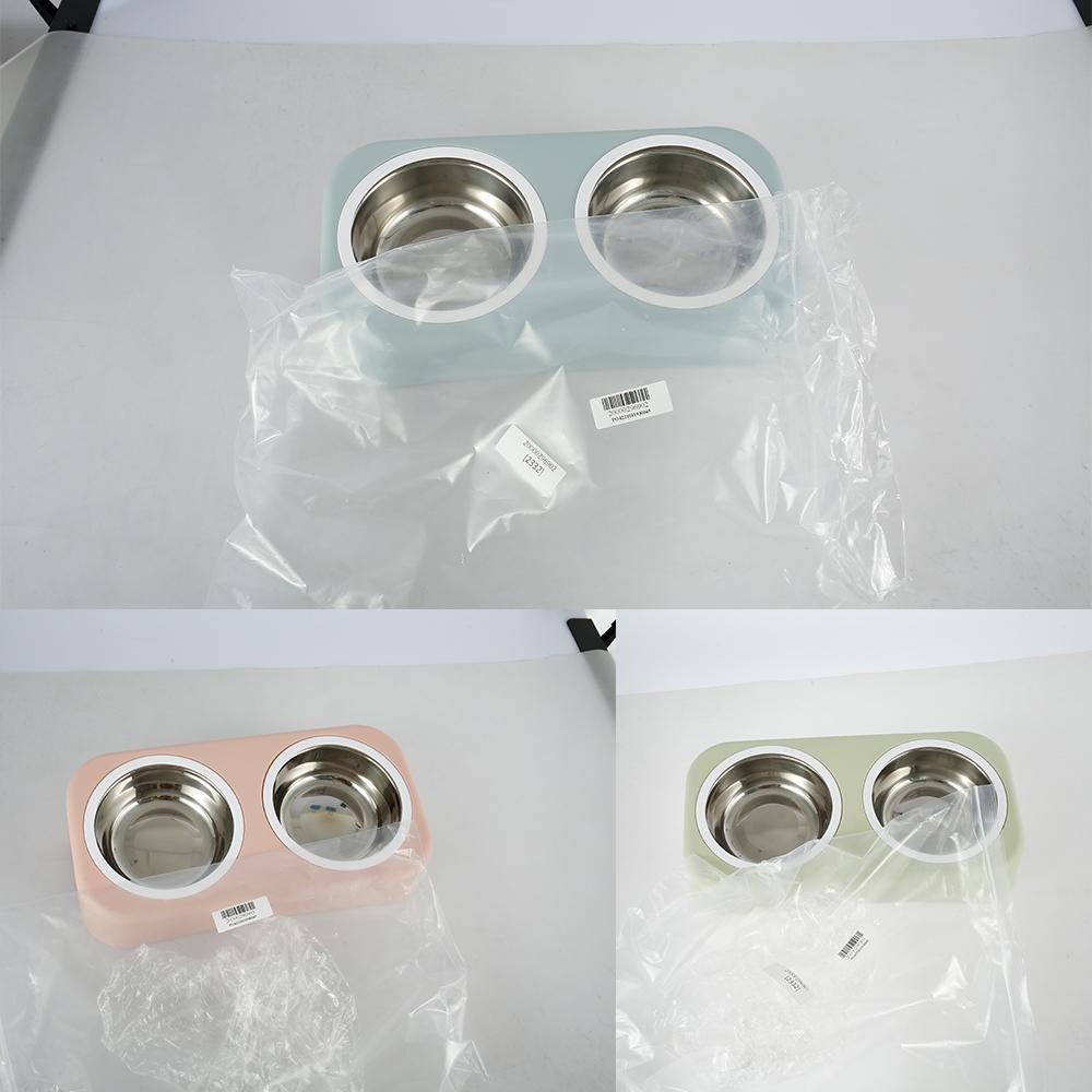 A pair of round stainless steel bowls for cats and small dogs, featuring an anti-skid base for stability during feeding.