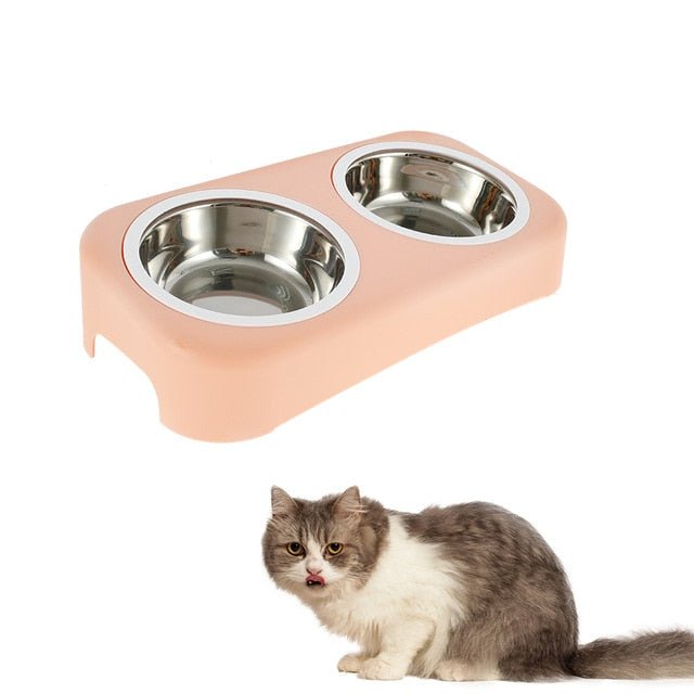 A pair of round stainless steel bowls for cats and small dogs, featuring an anti-skid base for stability during feeding.