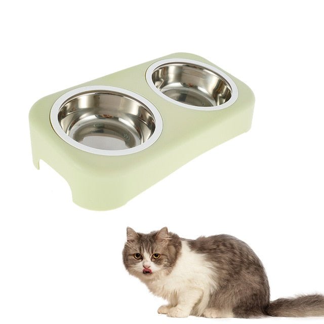 A pair of round stainless steel bowls for cats and small dogs, featuring an anti-skid base for stability during feeding.