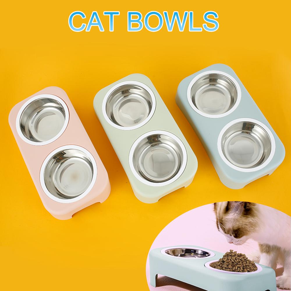 A pair of round stainless steel bowls for cats and small dogs, featuring an anti-skid base for stability during feeding.