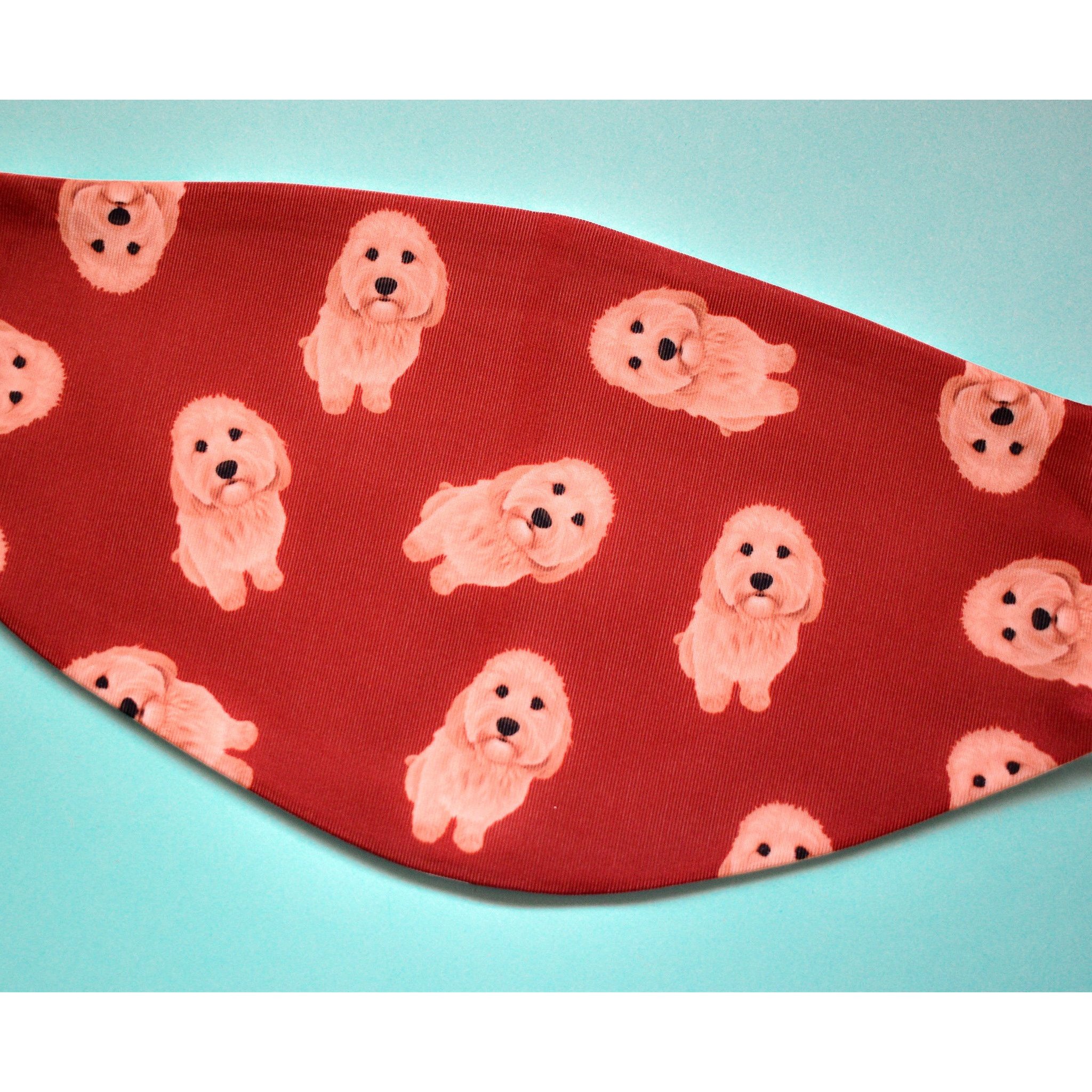 A stylish Cavapoo face cover made from breathable polyester and organic cotton, featuring a comfortable ear saver and available in various sizes.
