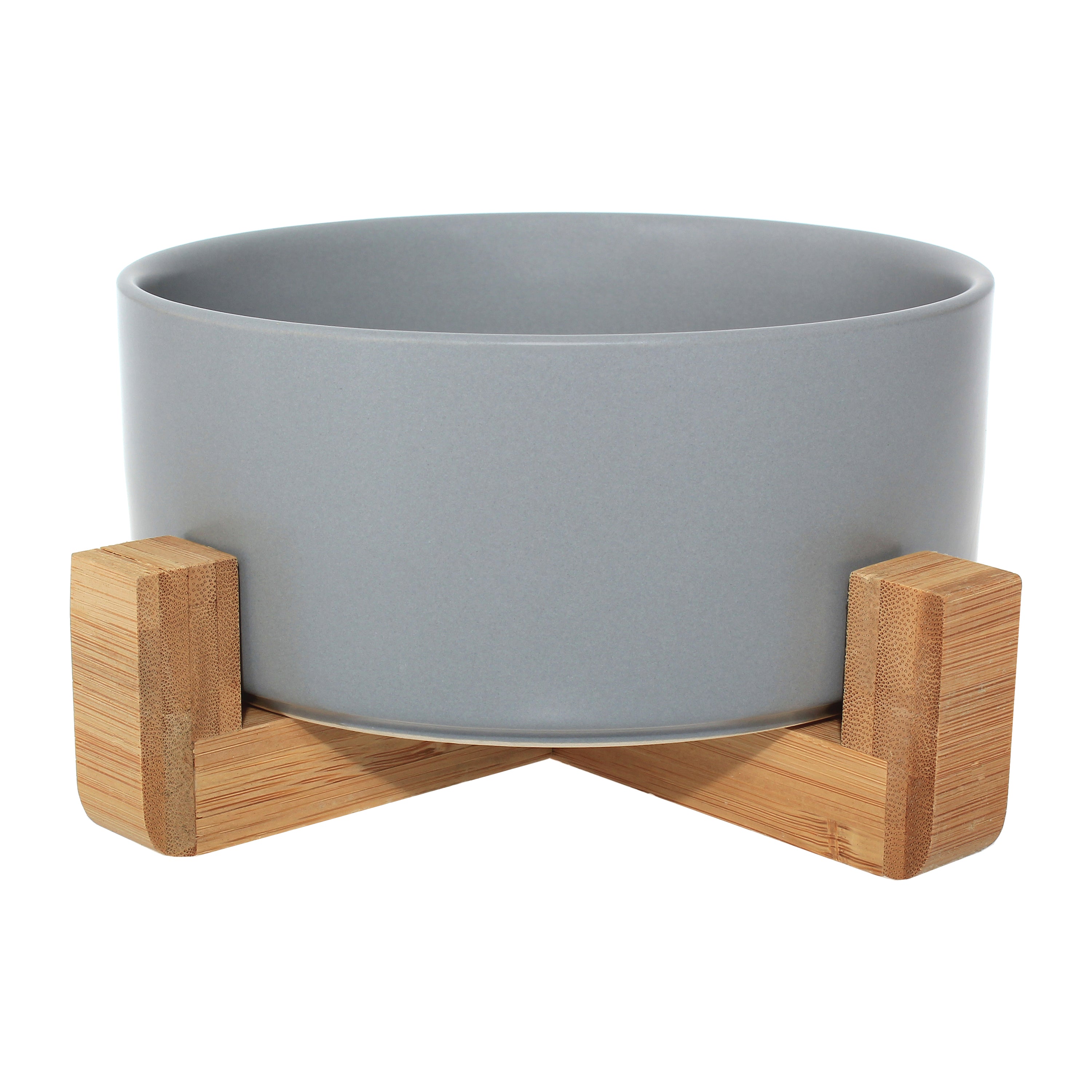 Ceramic bowl with bamboo stand designed for dogs and cats, featuring a stylish and stable design in vibrant colors.