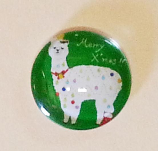 A green cabochon featuring a white alpaca image, perfect for jewelry making and crafts.
