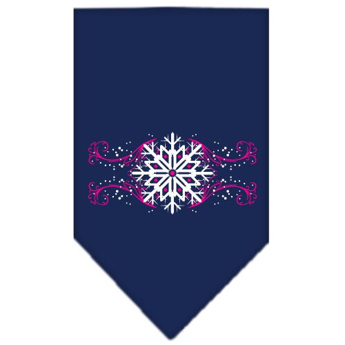 A pink dog bandana with snowflake swirls design, perfect for Christmas celebrations, tied around a dog's neck.