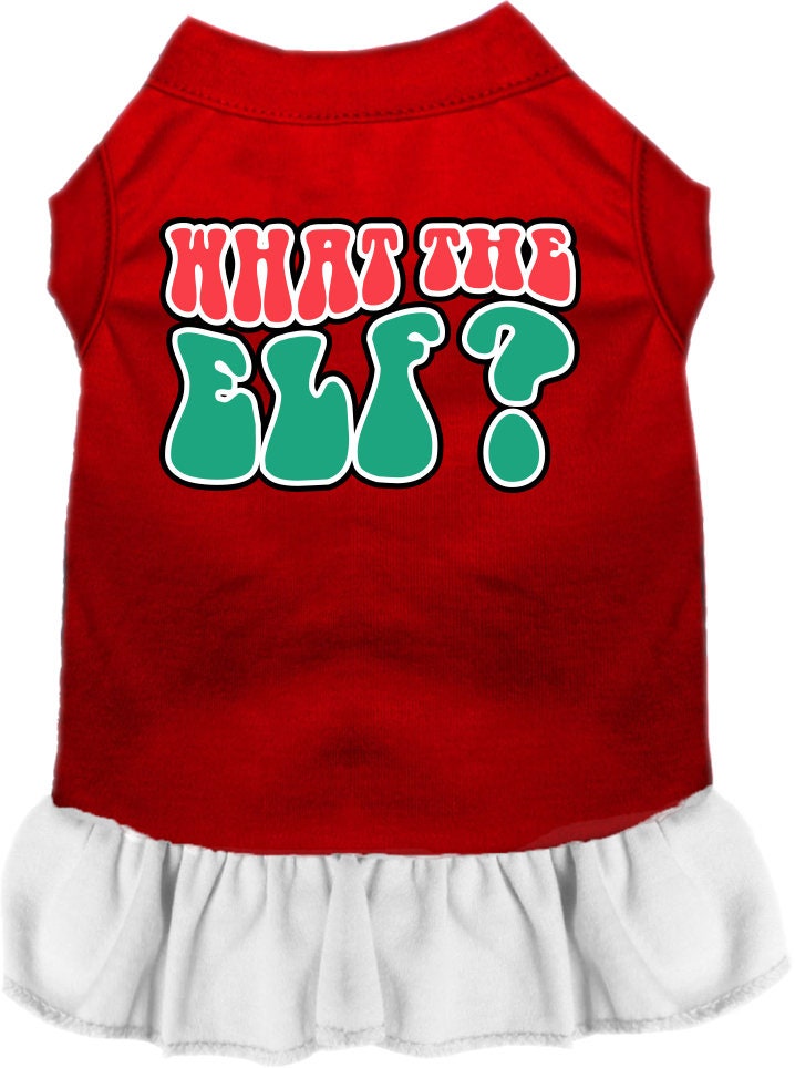 A festive Christmas dress for pets featuring the text 'What The Elf', designed with a cute ruffle and made from soft poly/cotton fabric.