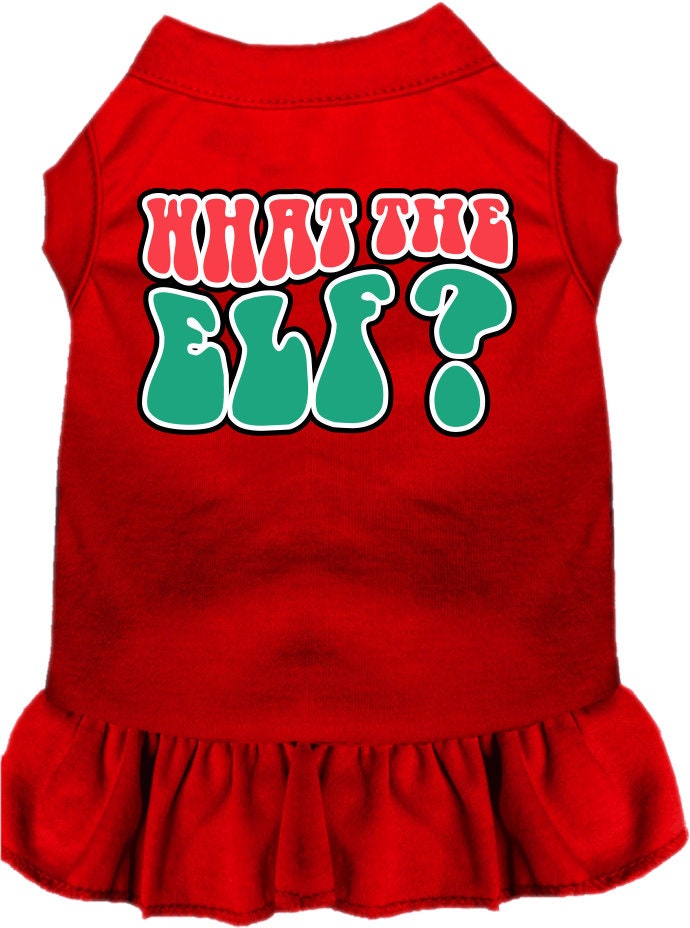 A festive Christmas dress for pets featuring the text 'What The Elf', designed with a cute ruffle and made from soft poly/cotton fabric.