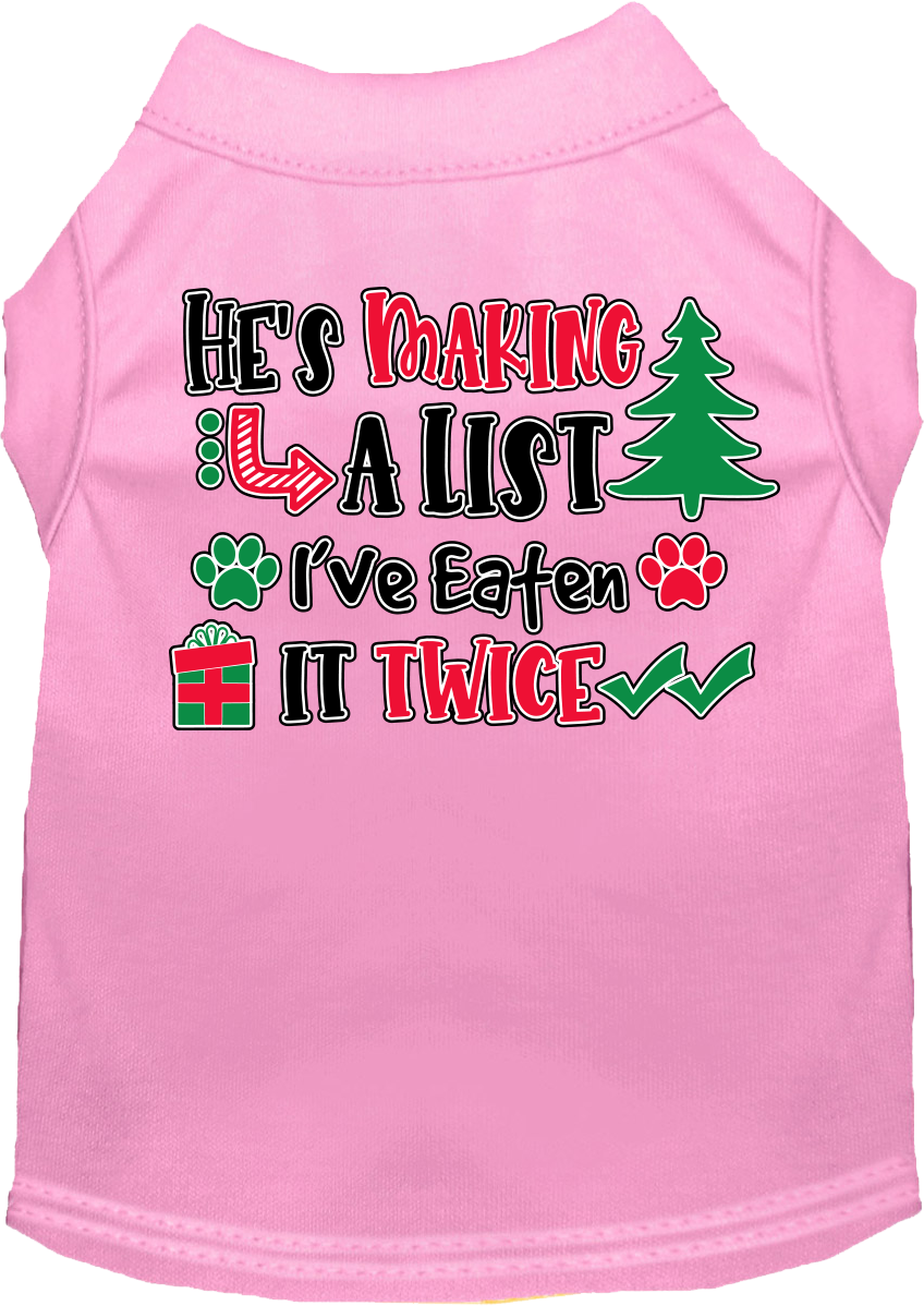 A festive Christmas shirt for dogs and cats, featuring the phrase 'He's Making A List, I've Eaten It Twice' in a playful design.