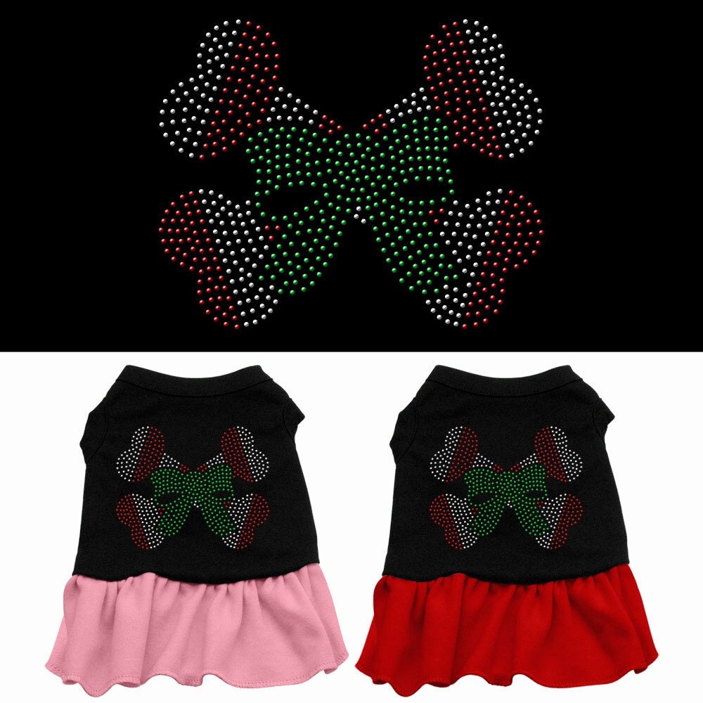 A festive Christmas dress for pets featuring a candy cane crossbones design, adorned with rhinestones for added sparkle.