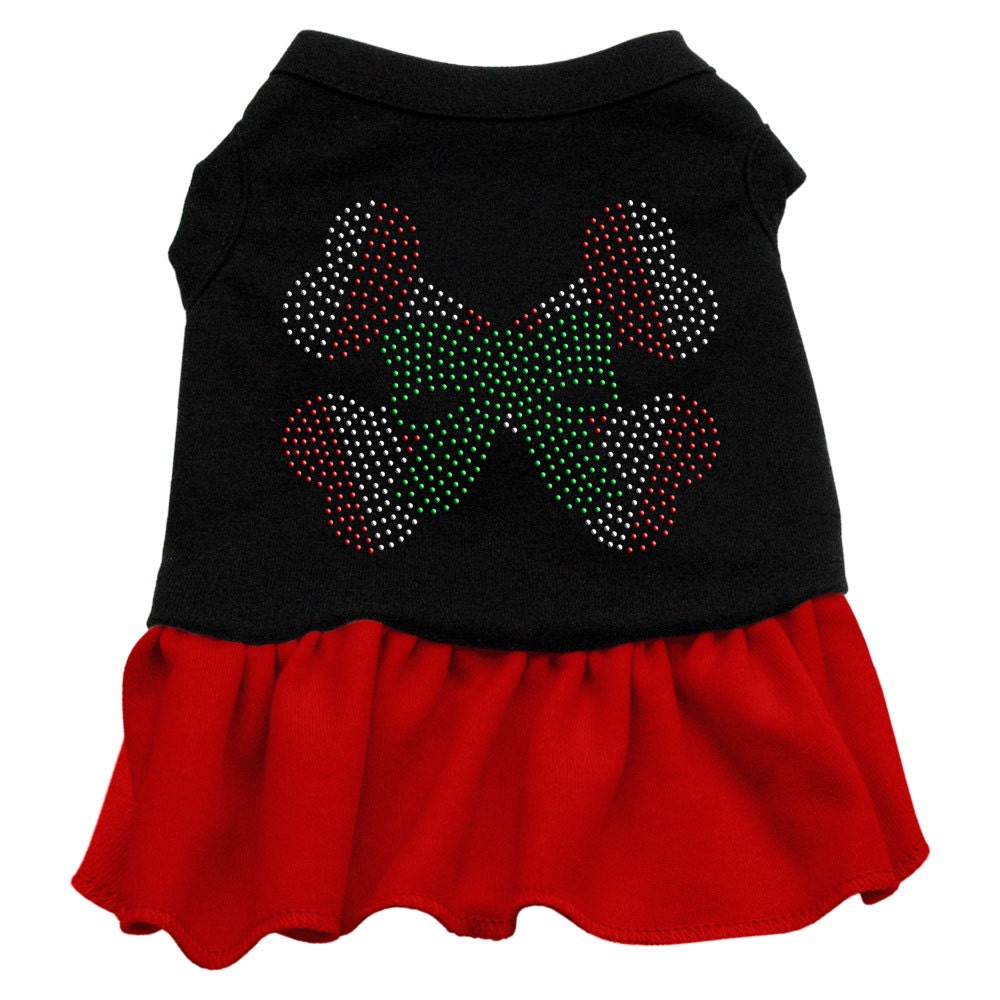 A festive Christmas dress for pets featuring a candy cane crossbones design, adorned with rhinestones for added sparkle.