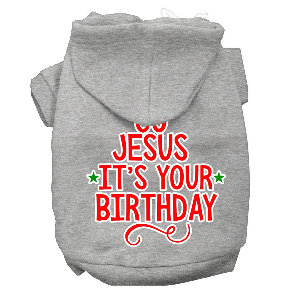 A cozy Christmas pet hoodie for dogs and cats, featuring the screen printed message 'Go Jesus, It's Your Birthday' in festive colors.