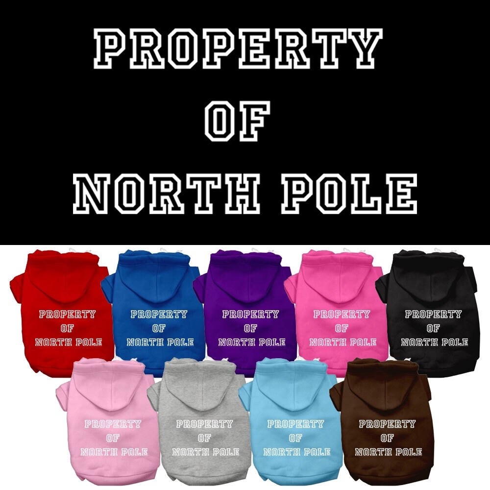 A cozy Christmas hoodie for dogs and cats, featuring a screen print that says 'Property of North Pole', perfect for festive occasions.
