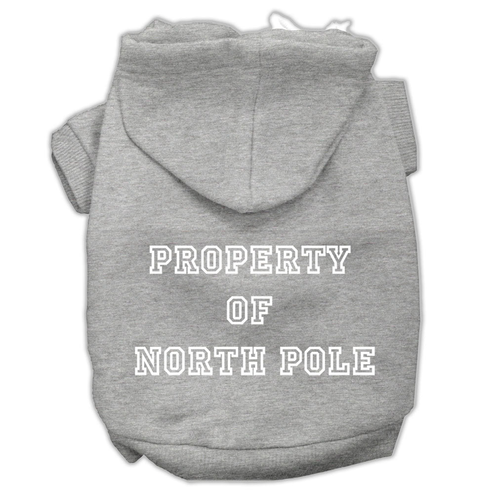 A cozy Christmas hoodie for dogs and cats, featuring a screen print that says 'Property of North Pole', perfect for festive occasions.
