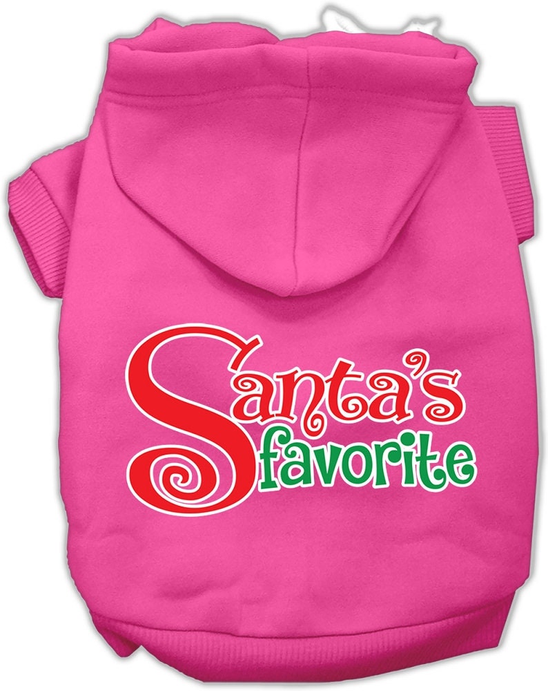 A cozy Christmas hoodie for pets, featuring the text 'Santa's Favorite' in festive colors, perfect for dogs and cats.