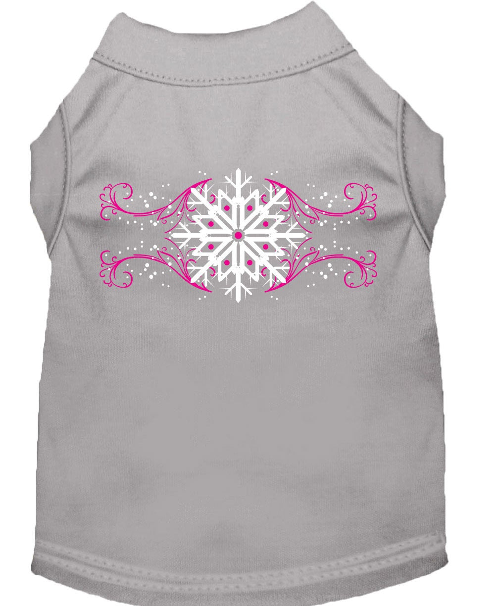 A soft and comfy Christmas dog shirt featuring pink snowflake swirls, perfect for festive occasions.