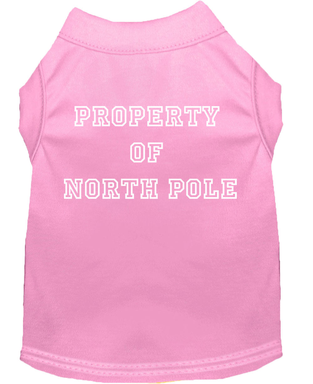 A festive Christmas dog shirt featuring the text 'Property Of North Pole', designed for comfort and durability, perfect for holiday celebrations.