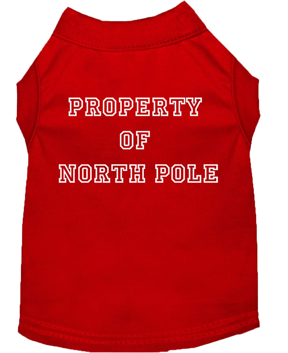 A festive Christmas dog shirt featuring the text 'Property Of North Pole', designed for comfort and durability, perfect for holiday celebrations.