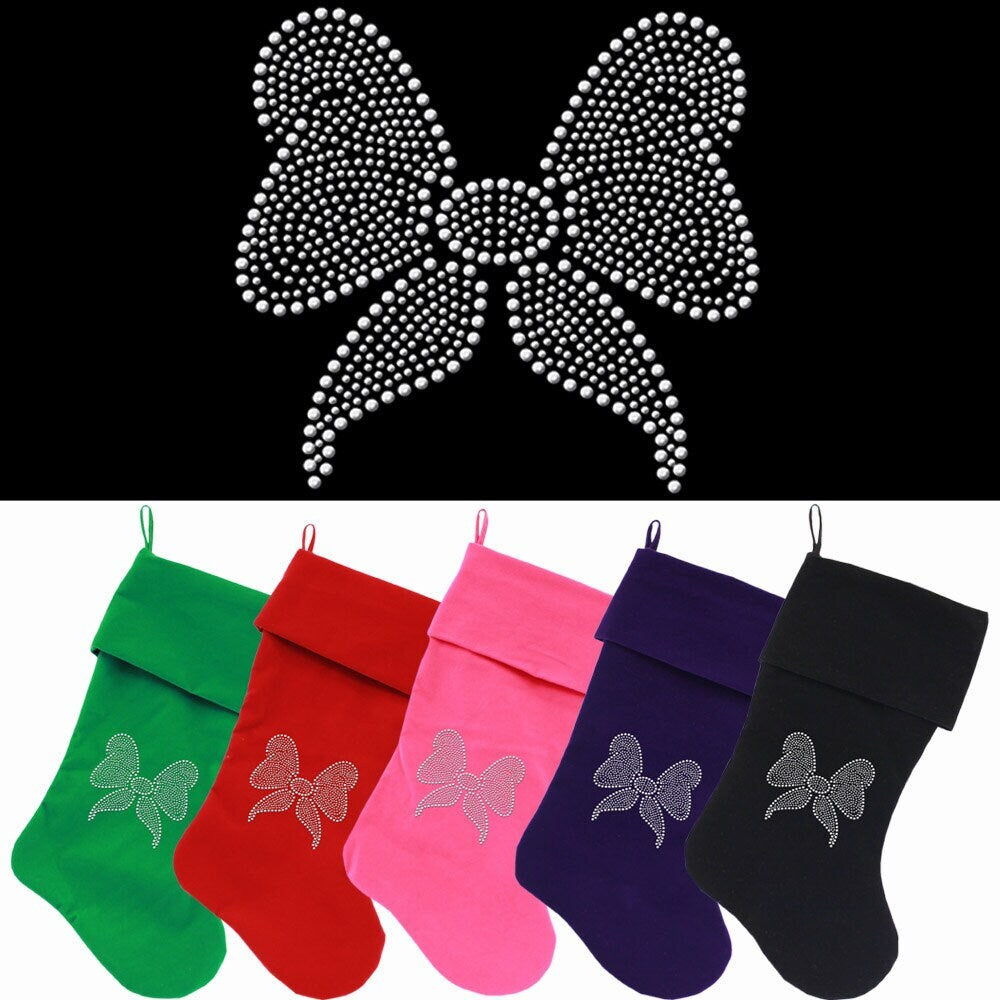 Luxurious 18-inch Christmas stocking made of soft velvet with a clear rhinestone bow, perfect for holiday decor.