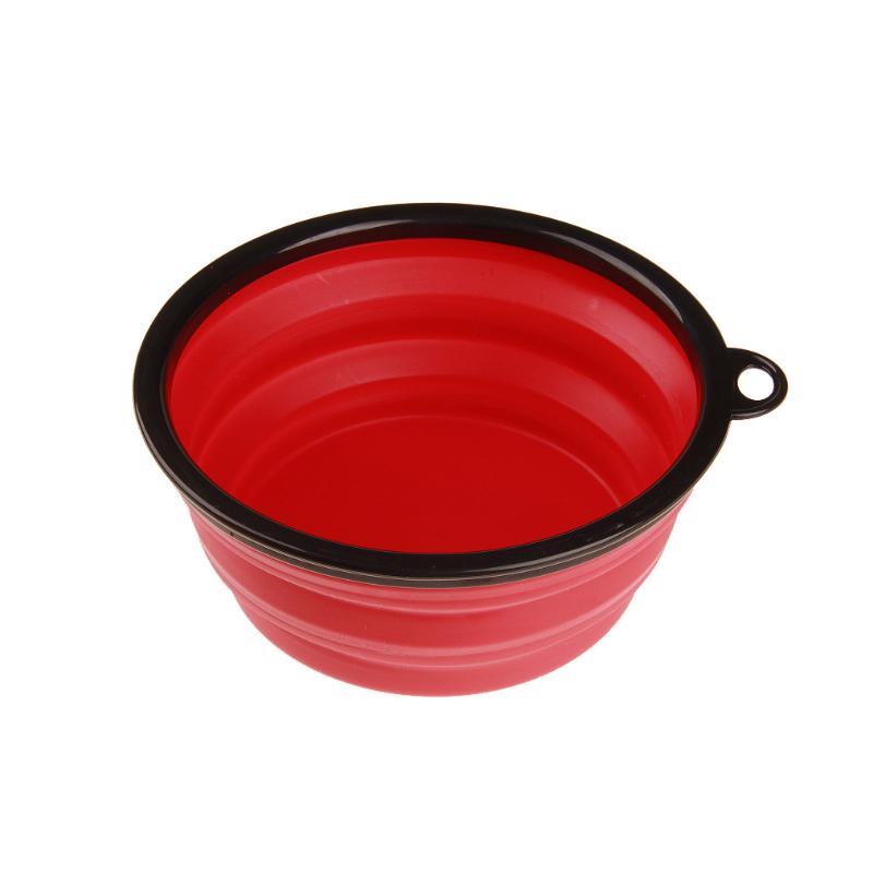 Collapsible Silicone Bowl for Dogs in vibrant colors, lightweight and portable with a carabiner attached.