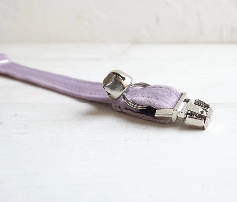 Stylish violet pet collar with rose gold hardware and adjustable fit, designed for comfort and durability.