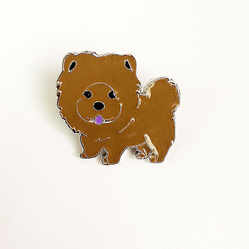 Colorful enamel pin badge featuring a cute pet design, perfect for pet lovers.