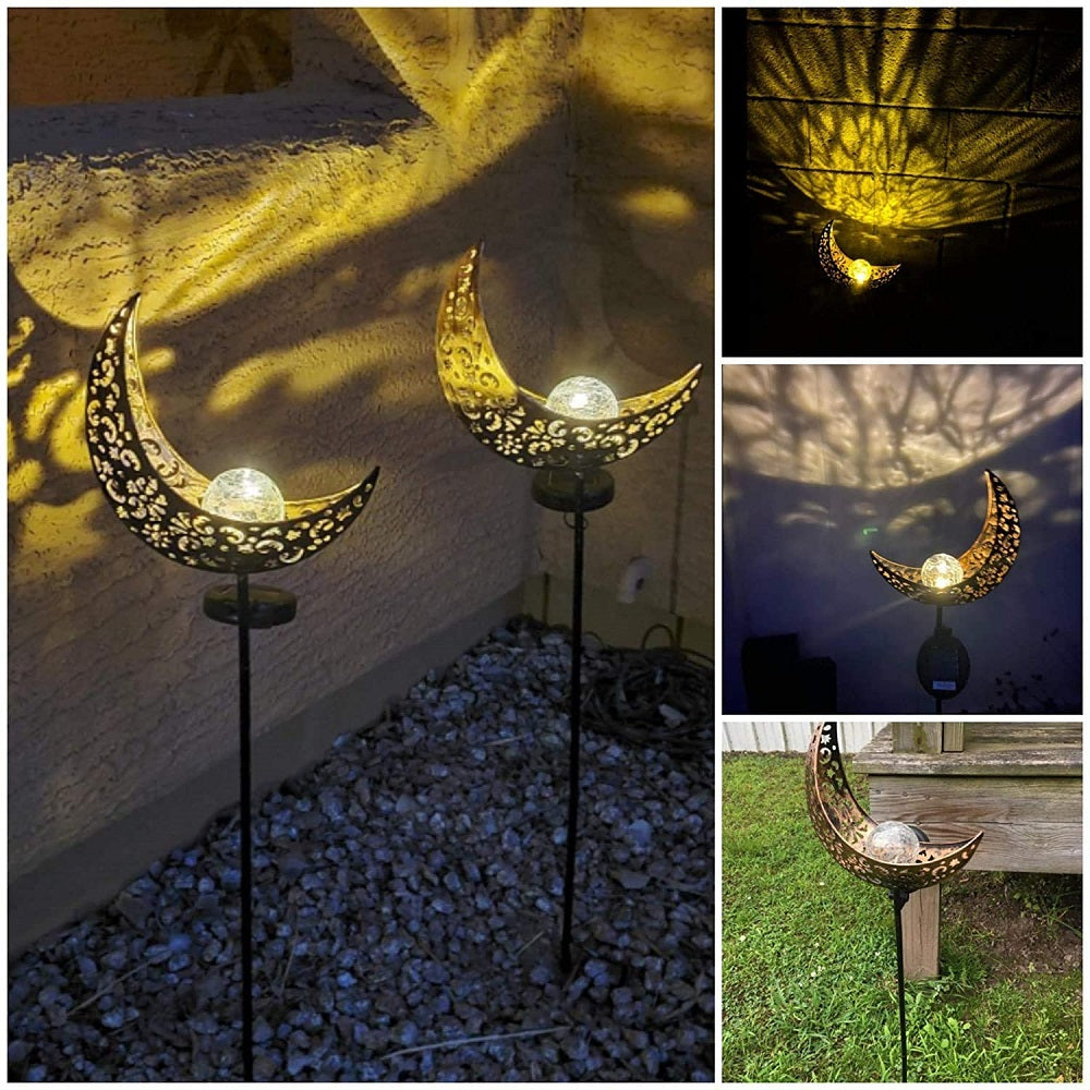Crackle Glass Globe Metal Light illuminating a garden path, showcasing its beautiful design and warm white LED glow.