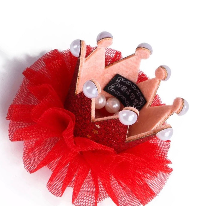 A stylish crown designed for pets, featuring vibrant colors and a durable build, perfect for special occasions.