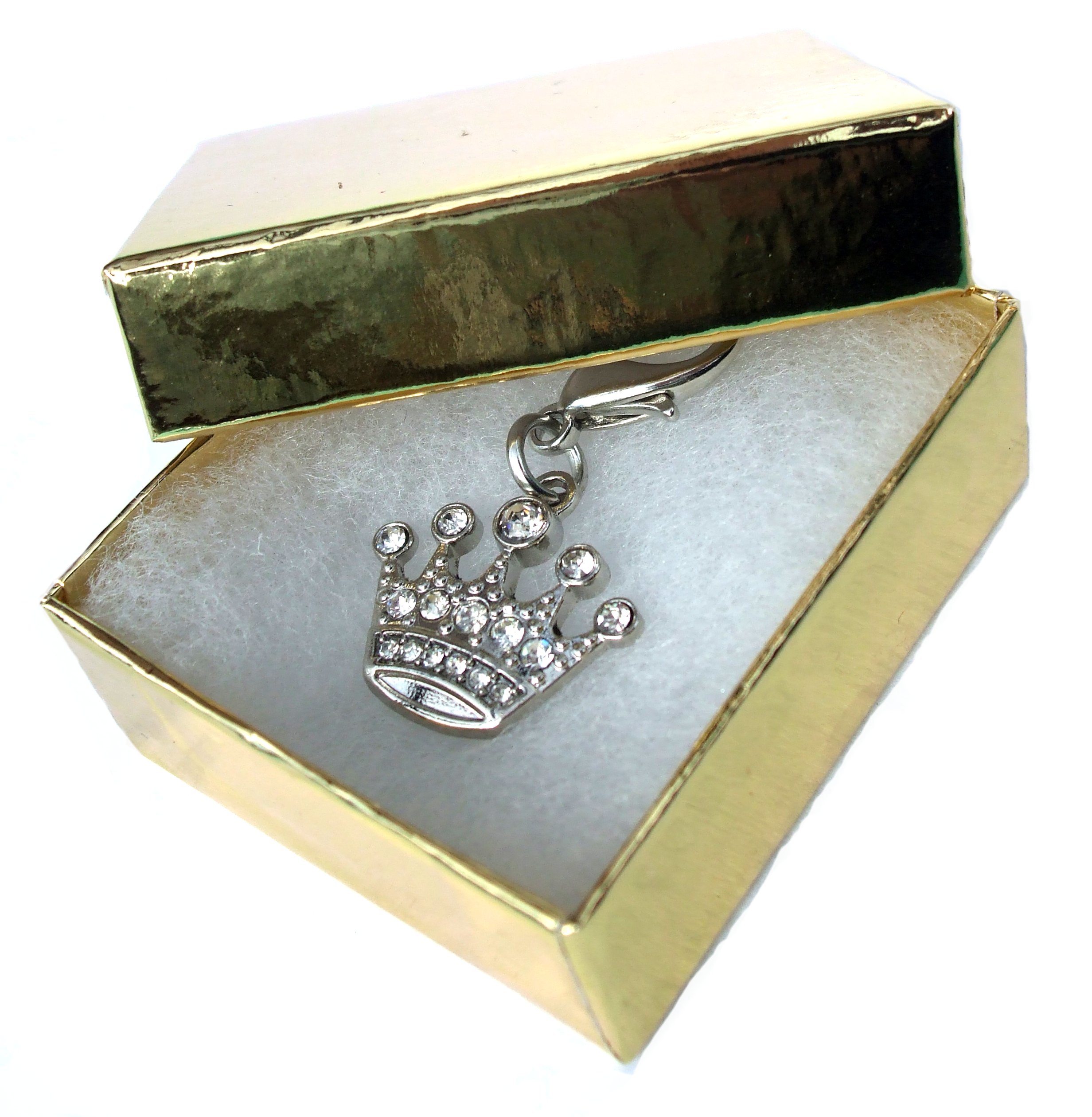 Crown pendant inside gift box.