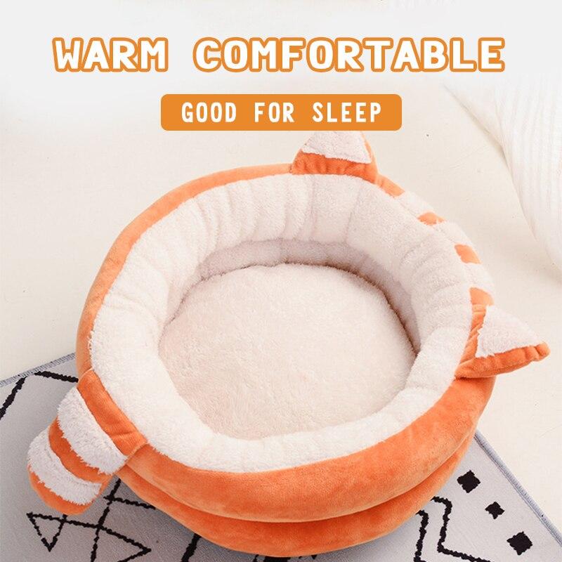 A cozy Cute Cat Bed House made of soft fleece and PP cotton, designed for cats and dogs, featuring a warm and inviting sleeping space.