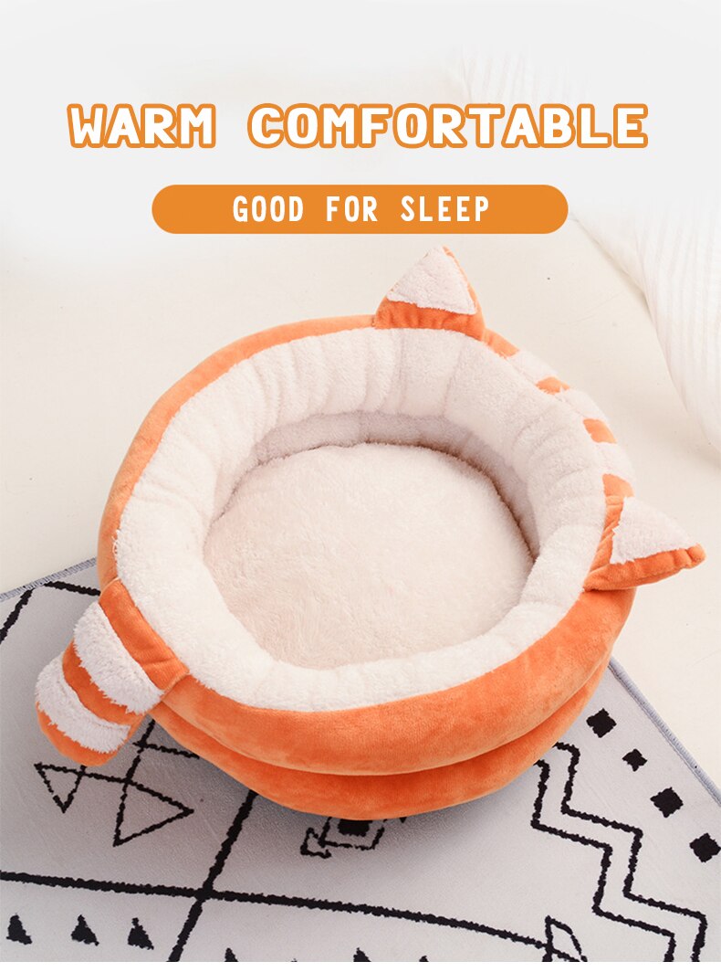 A cozy Cute Cat Bed House made of soft fleece and PP cotton, designed for cats and dogs, featuring a warm and inviting sleeping space.