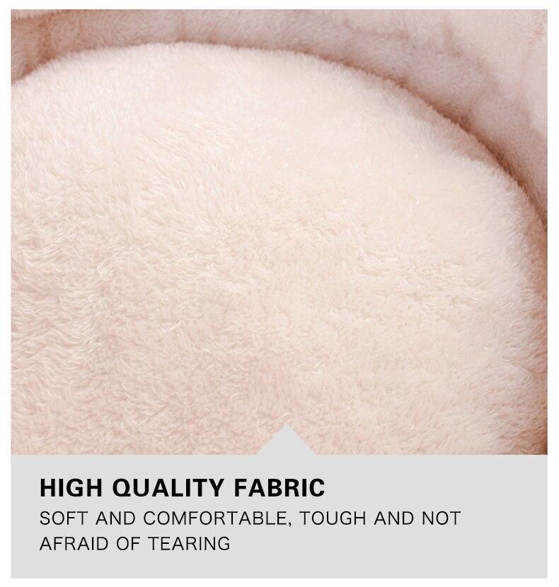 A cozy Cute Cat Bed House made of soft fleece and PP cotton, designed for cats and dogs, featuring a warm and inviting sleeping space.