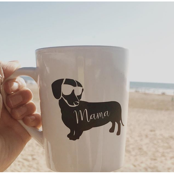 A handmade Dachshund Mama Coffee Mug featuring a cute dachshund design, perfect for dog lovers.