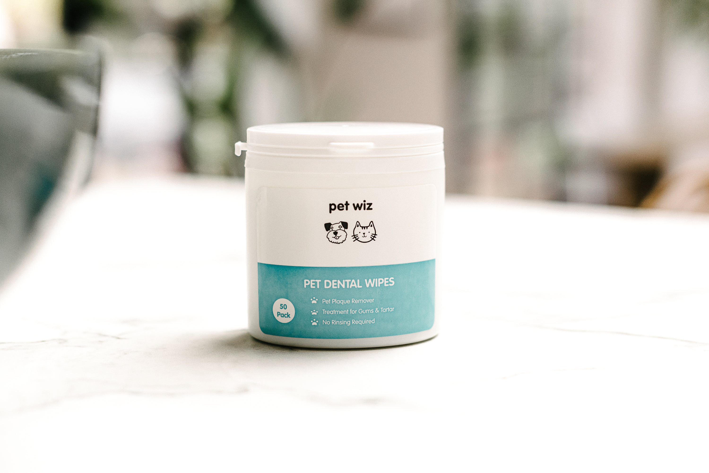 Dental Finger Wipes for Dogs & Cats in a convenient packaging, designed for easy oral hygiene maintenance with spearmint oil.