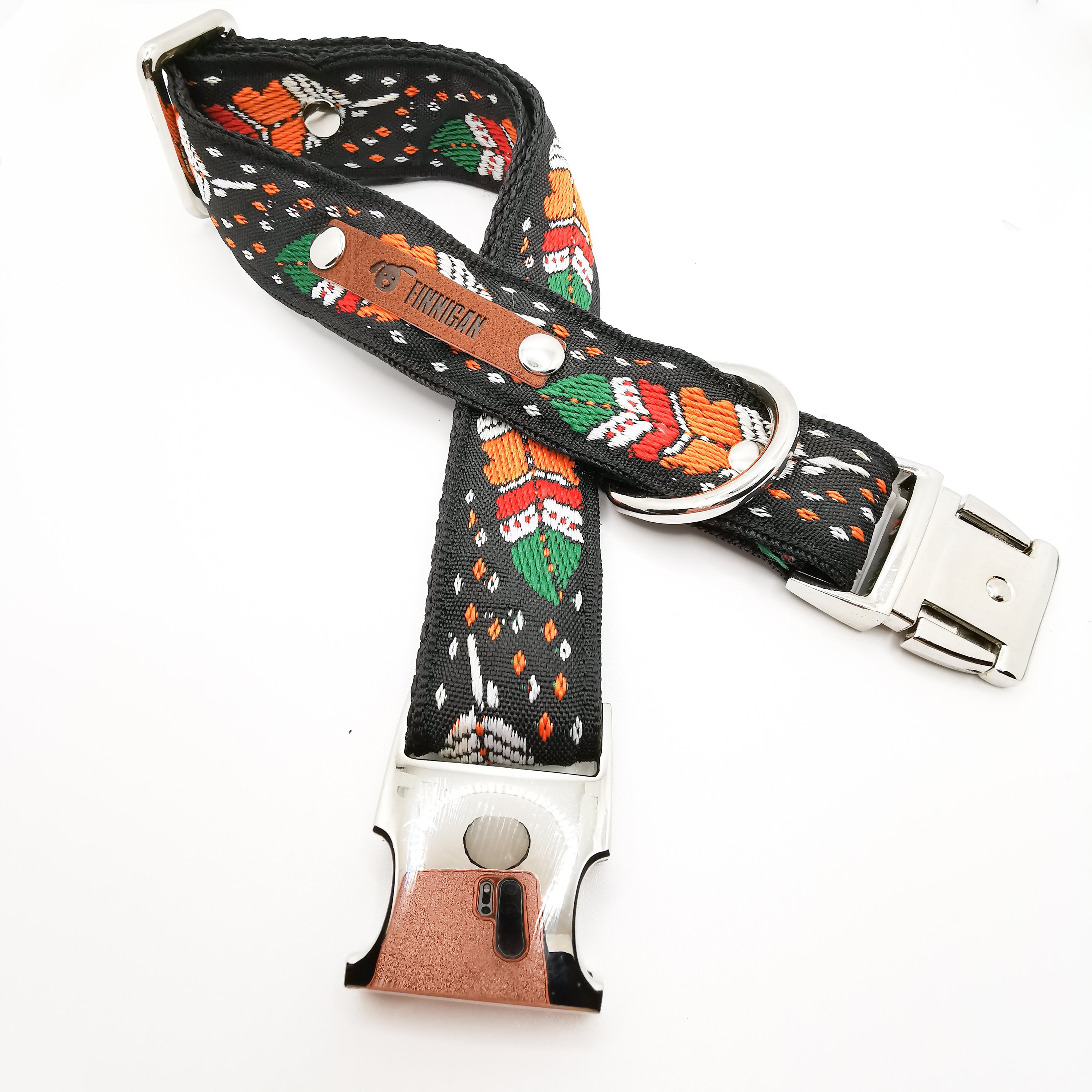 A stylish designer dog collar featuring unique fabrics, adjustable size, and a personalised aluminium buckle.