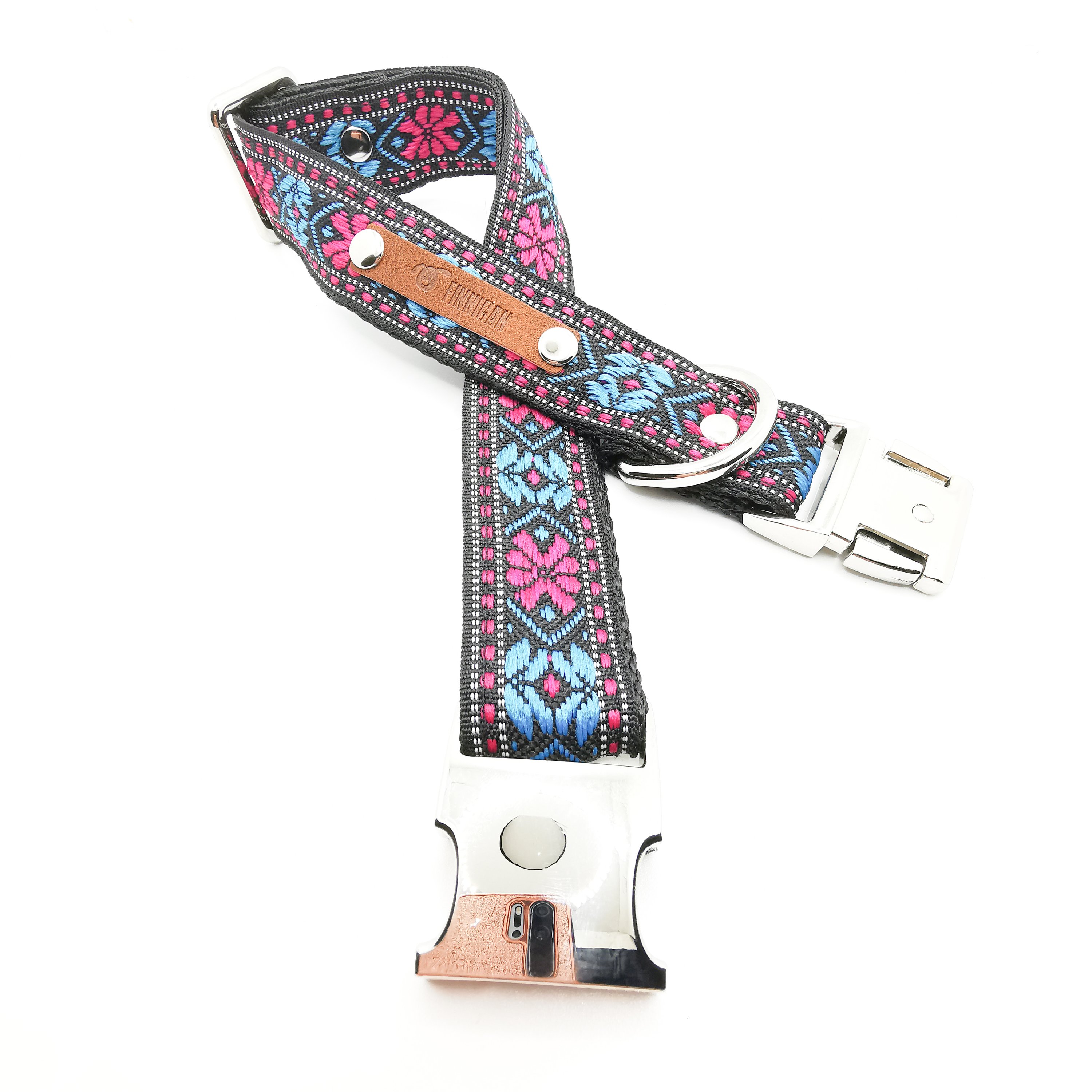 A stylish designer dog collar featuring unique fabrics, adjustable size, and a personalised aluminium buckle.