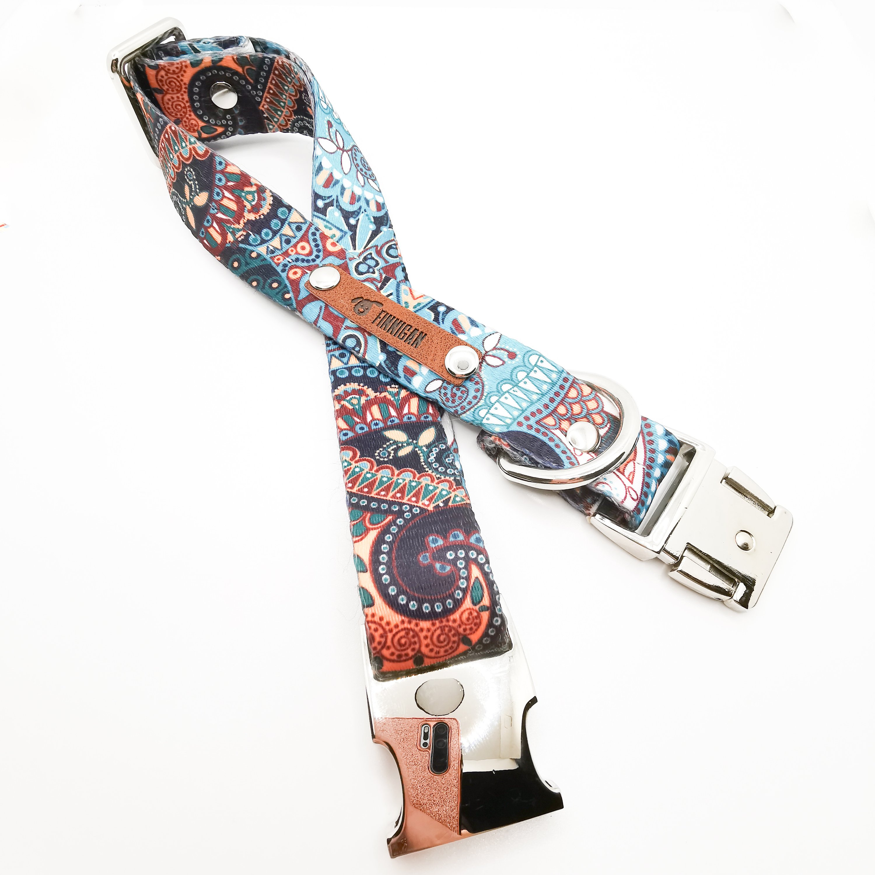A stylish designer dog collar featuring unique fabrics, adjustable size, and a personalised aluminium buckle.