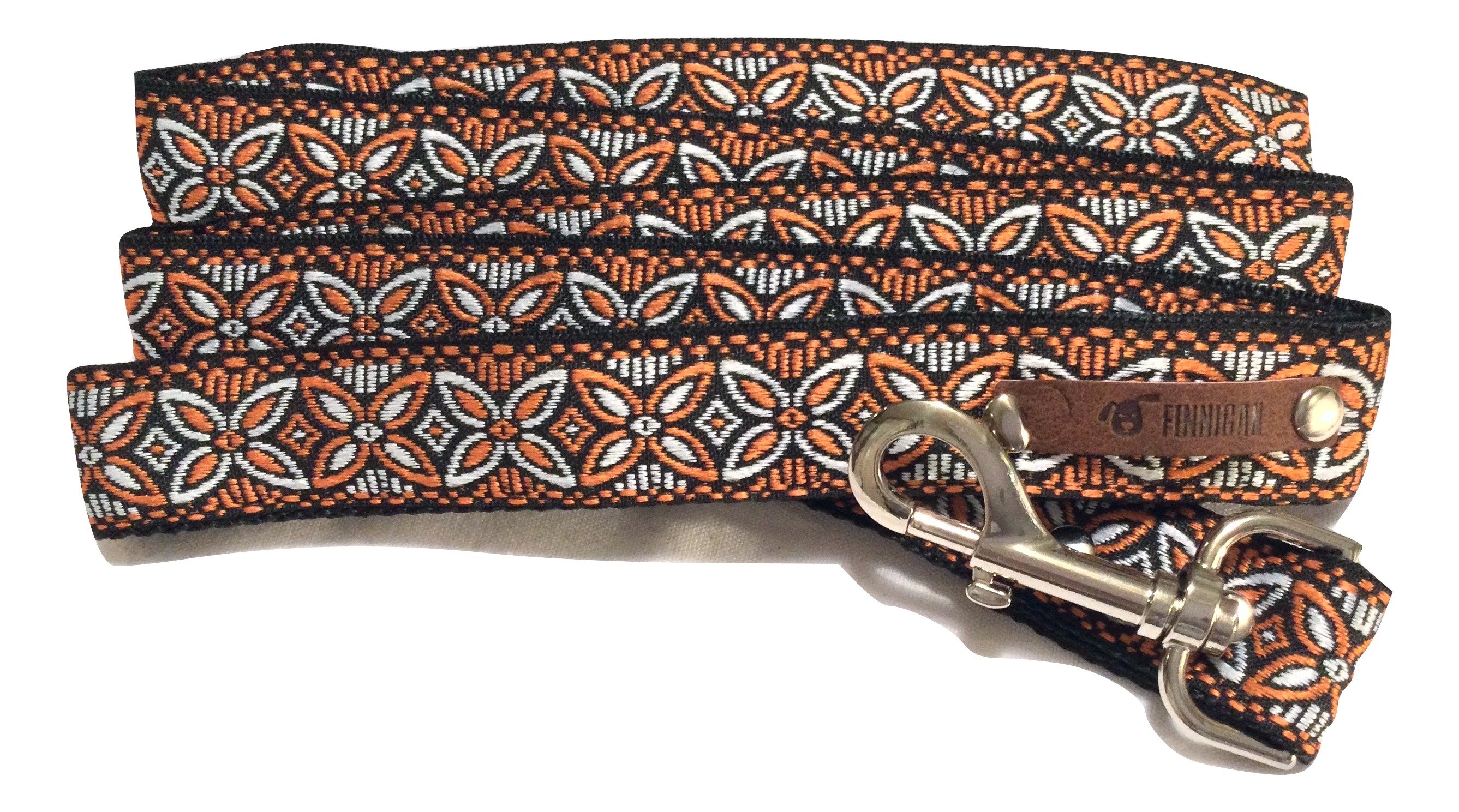 A stylish designer dog collar featuring unique fabrics, adjustable size, and a personalised aluminium buckle.