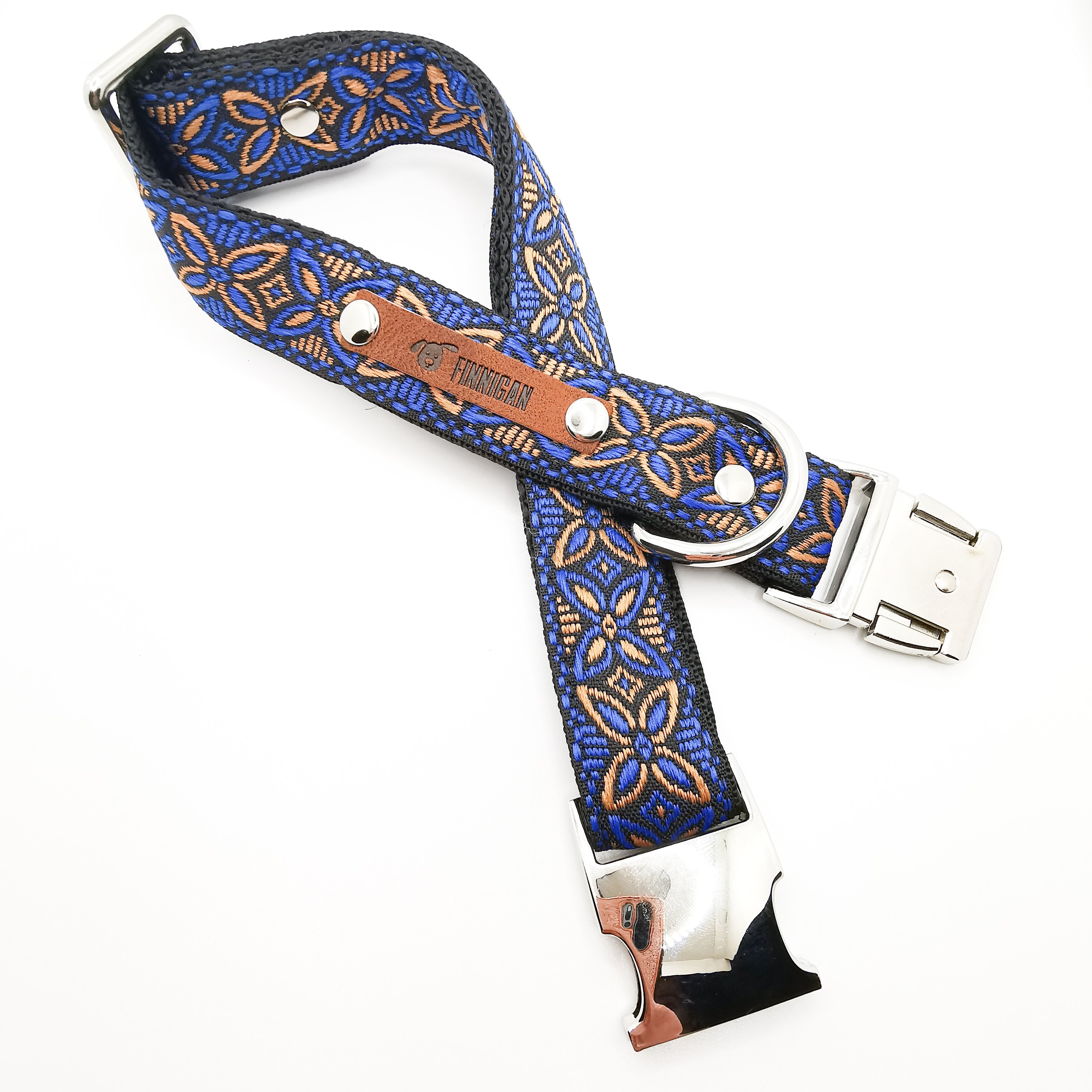 A stylish designer dog collar featuring unique fabrics, adjustable size, and a personalised aluminium buckle.