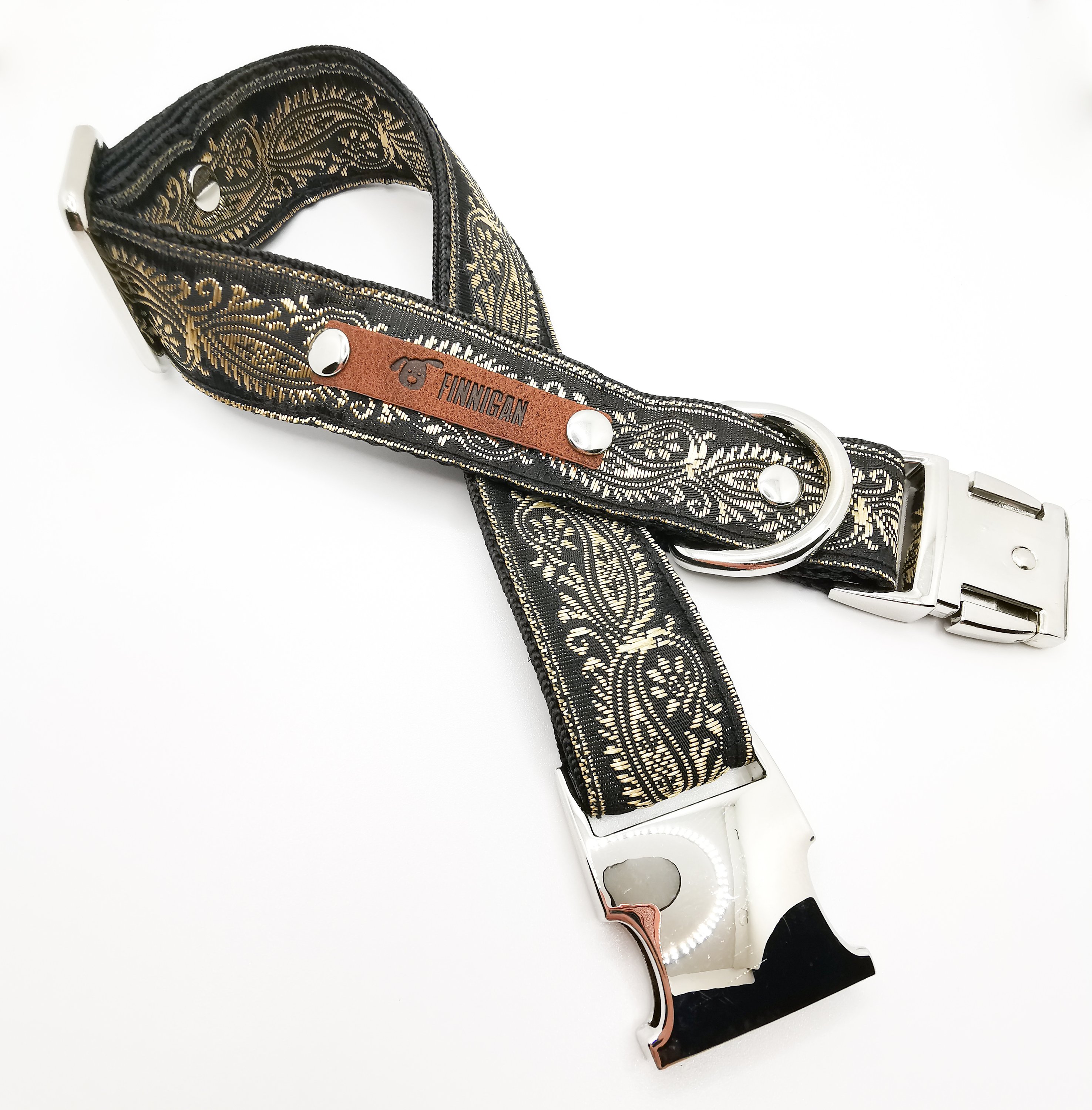 A stylish designer dog collar featuring unique fabrics, adjustable size, and a personalised aluminium buckle.