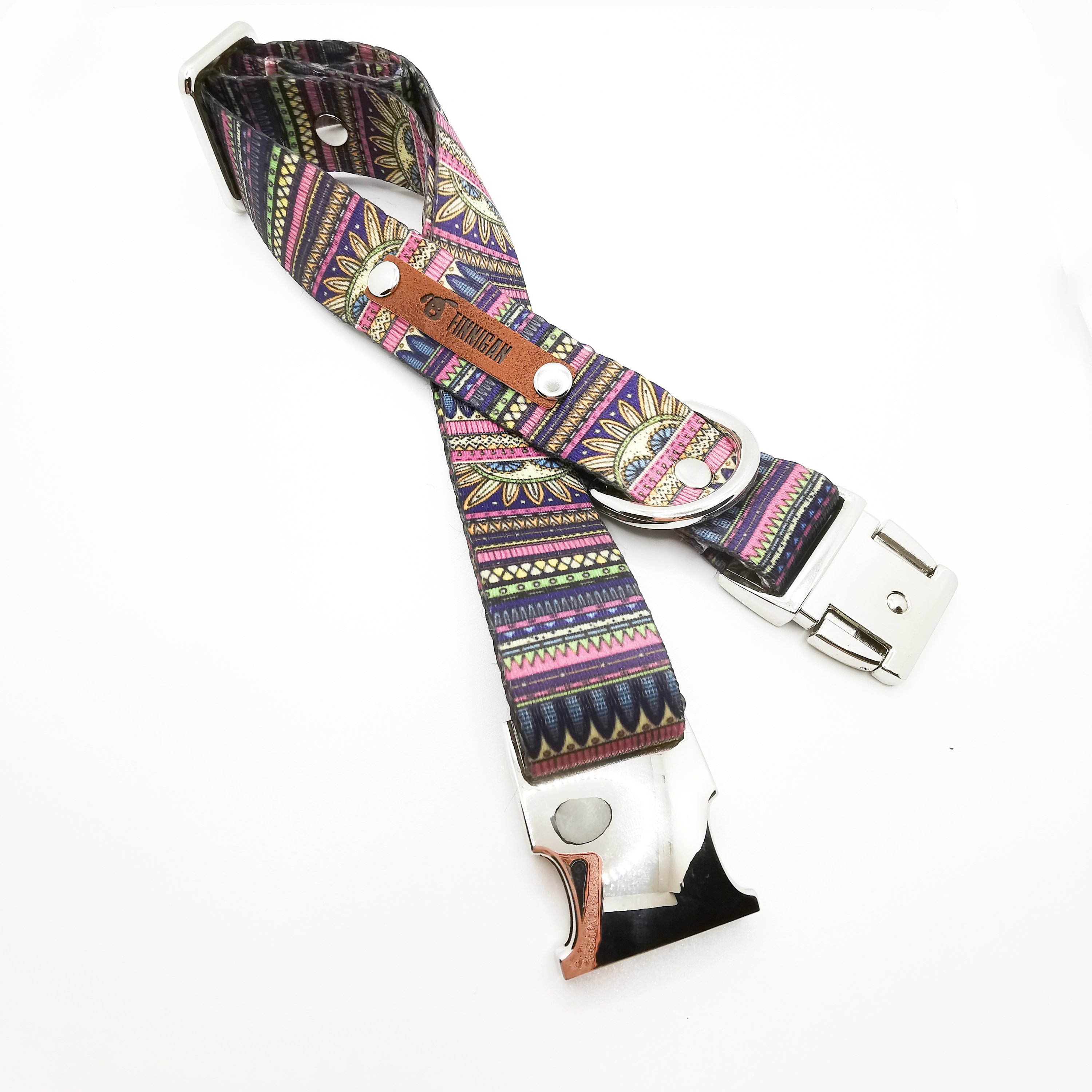 A stylish designer dog collar featuring unique fabrics, adjustable size, and a personalised aluminium buckle.