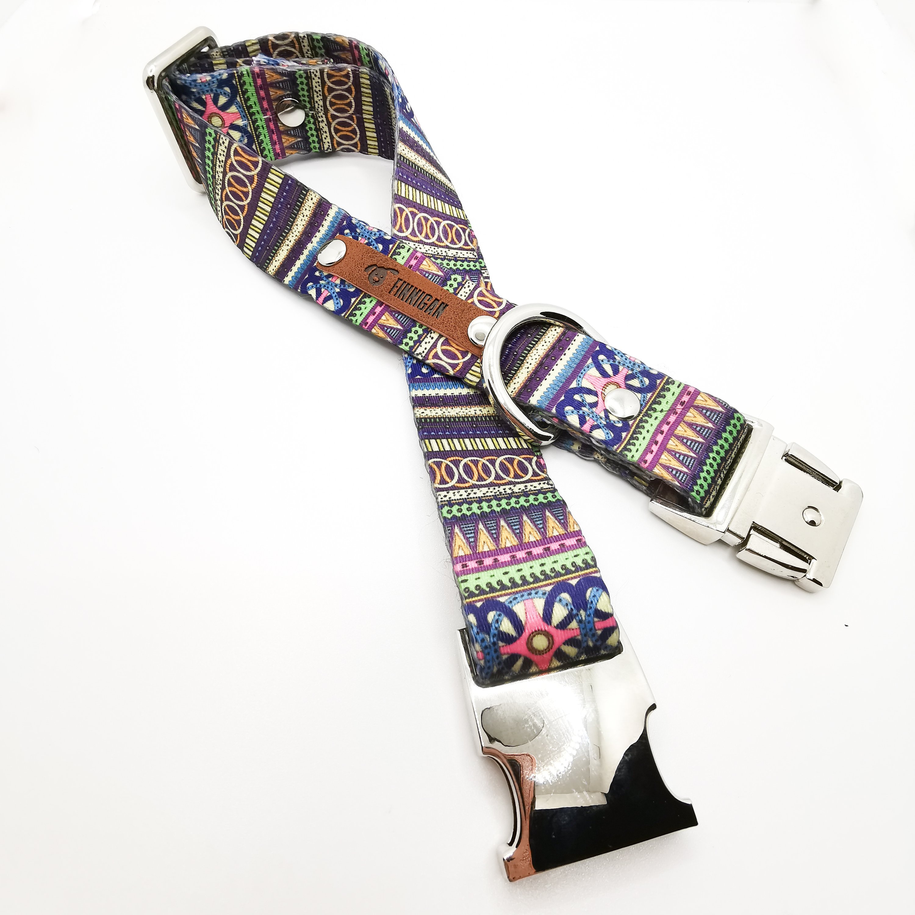 A stylish designer dog collar featuring unique fabrics, adjustable size, and a personalised aluminium buckle.