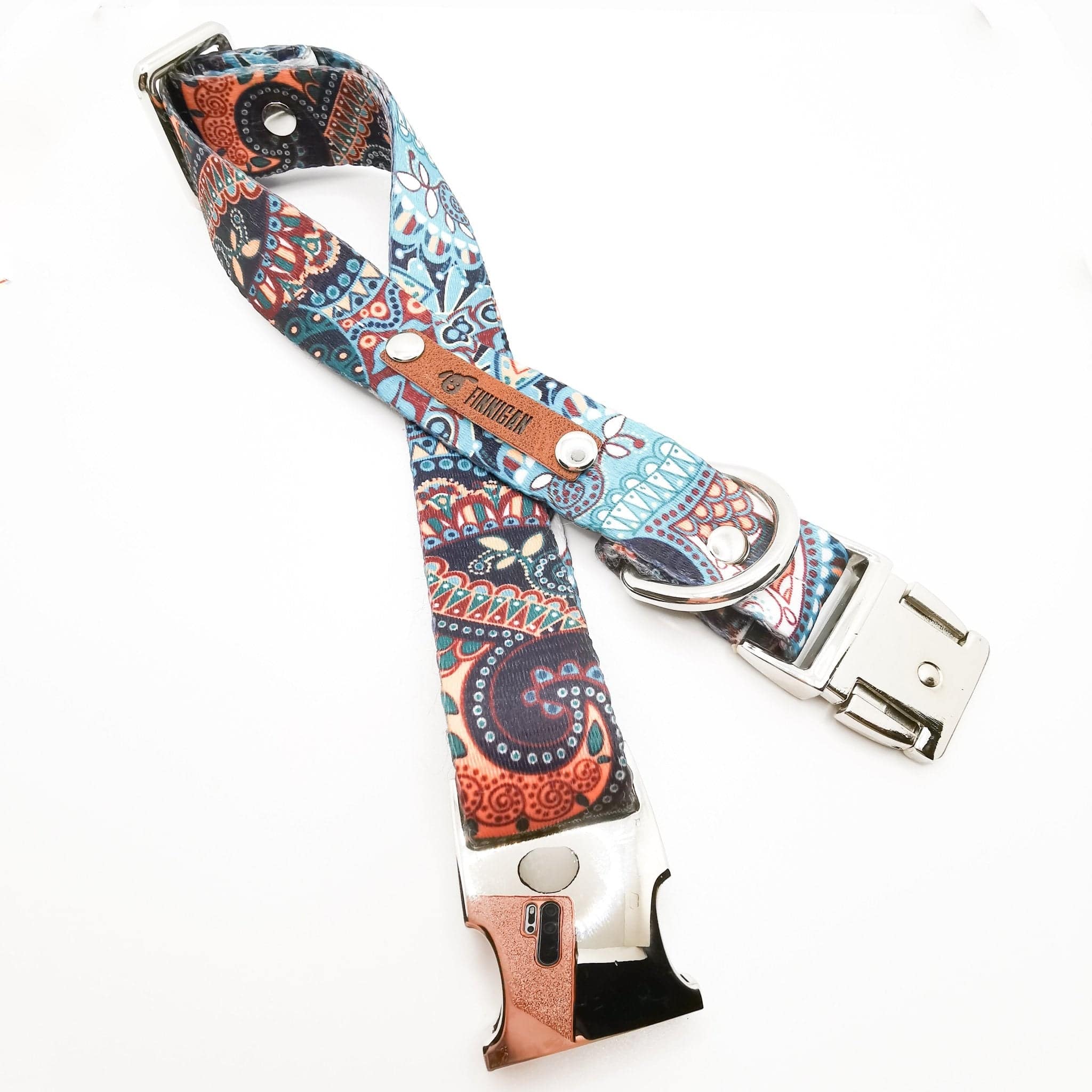 A stylish designer dog collar featuring unique fabrics, adjustable size, and a personalised aluminium buckle.