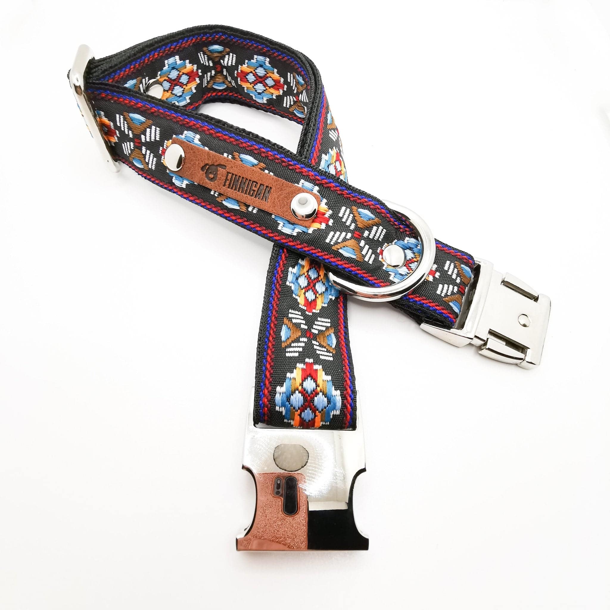 A stylish designer dog collar featuring unique fabrics, adjustable size, and a personalised aluminium buckle.