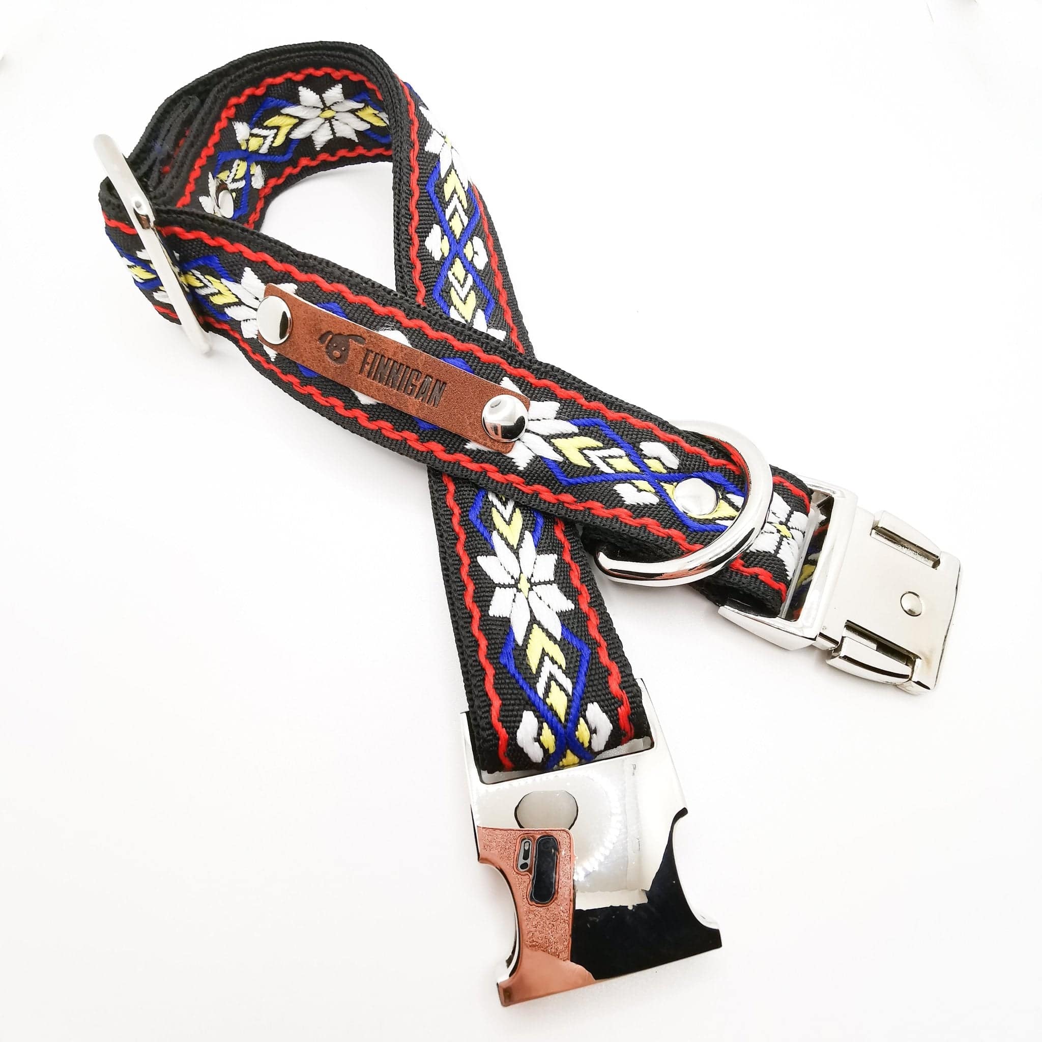 A stylish designer dog collar featuring unique fabrics, adjustable size, and a personalised aluminium buckle.