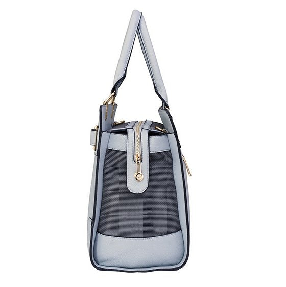 Designer grey vegan leather pet carrier with mesh windows and removable lining, suitable for small dogs and cats.