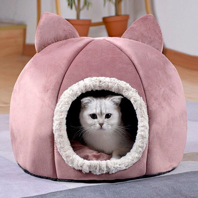 A cozy Detachable Soft Kennel Cat Bed in various colors, featuring a soft flannel interior and a detachable cover for easy cleaning.