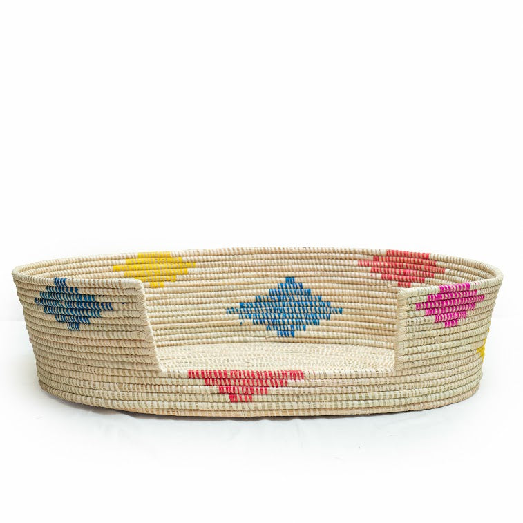 Dhahabu Handcrafted Eco-Friendly Pet Bed made from natural materials, showcasing vibrant colors and intricate weaving by skilled artisans.