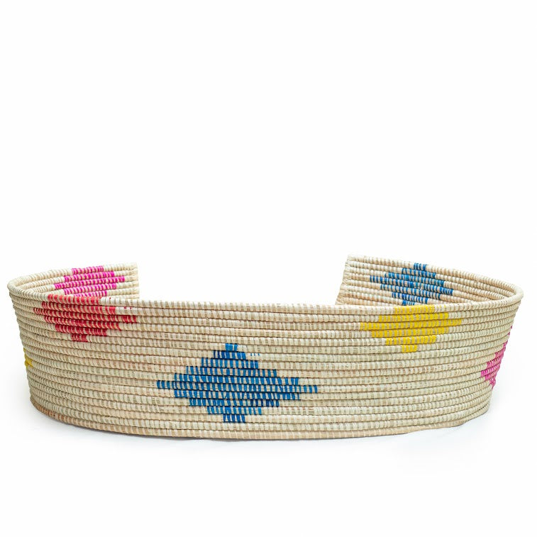 Dhahabu Handcrafted Eco-Friendly Pet Bed made from natural materials, showcasing vibrant colors and intricate weaving by skilled artisans.