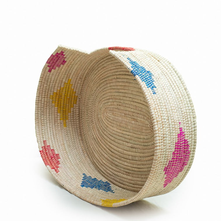 Dhahabu Handcrafted Eco-Friendly Pet Bed made from natural materials, showcasing vibrant colors and intricate weaving by skilled artisans.